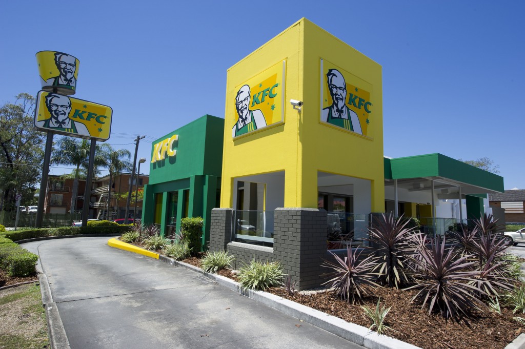 BRISBANE, AUSTRALIA - NOVEMBER 15: KFC unveils its national green and gold makeover to support the Aussie cricket team this summer as KFC stores Go Green & Gold at KFC Clayfield on November 15, 2013 in Brisbane, Australia. (Photo by Marc Grimwade/Getty Images)